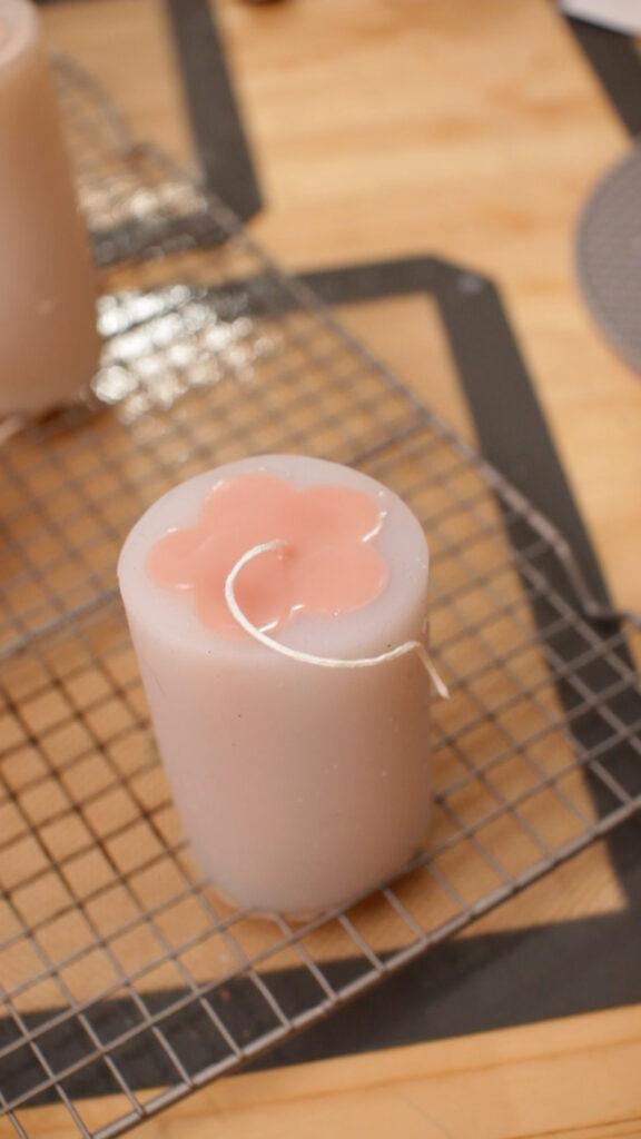 silicone-candle-mold-with-pink-wax-inside