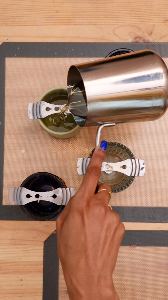 pouring-melted-soy-wax-into-candle-jar