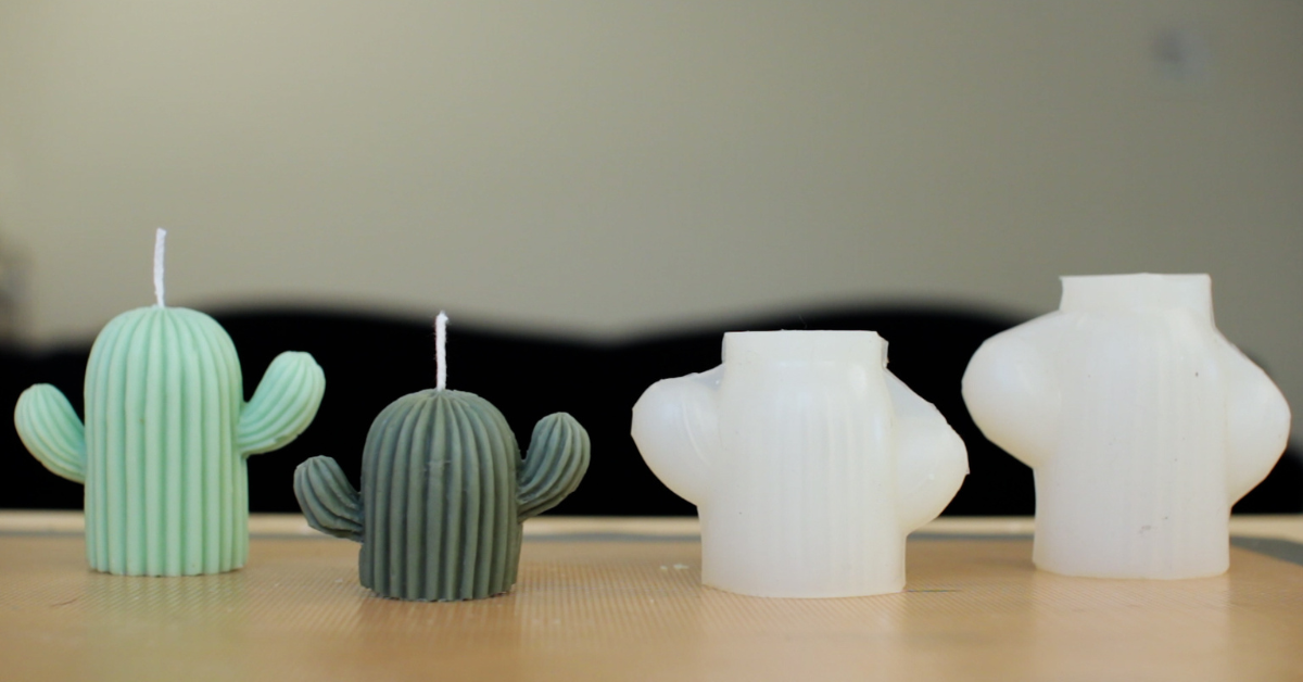 green-cactus-candles-next-to-white-candle-molds