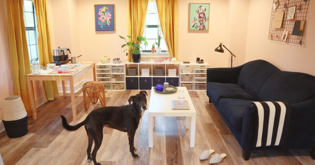 pink-room-with-craft-table-and-blue-couch