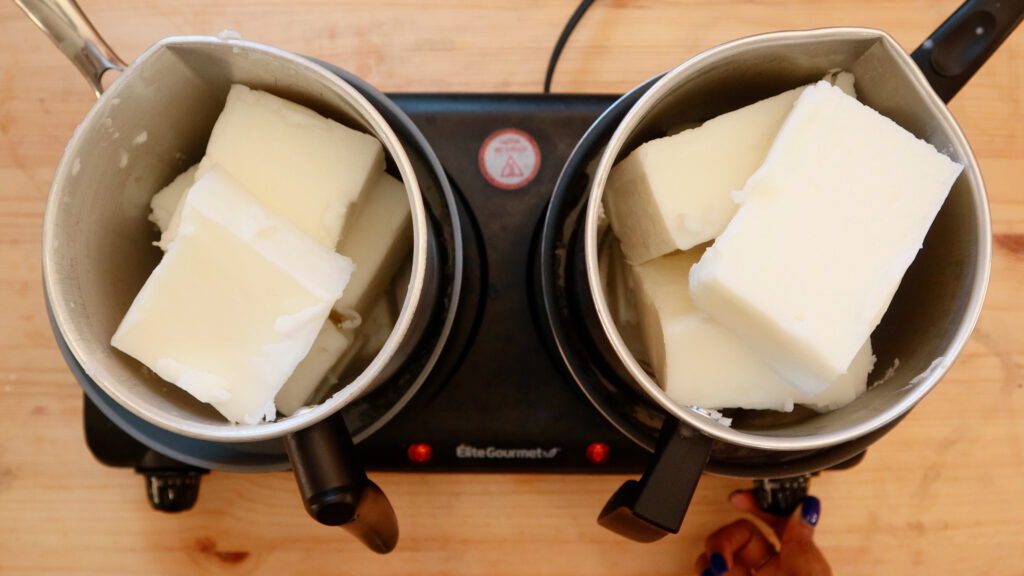 blocks-of-candle-wax-in-two-melting-pitchers