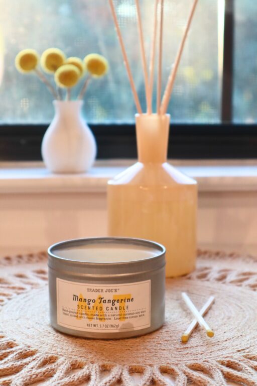 trader-joes-mango-tangerine-candle-with-matches-on-table